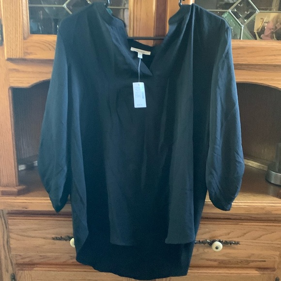 Maurices Tops - brand new with tags Maurices extra large black V-neck top .